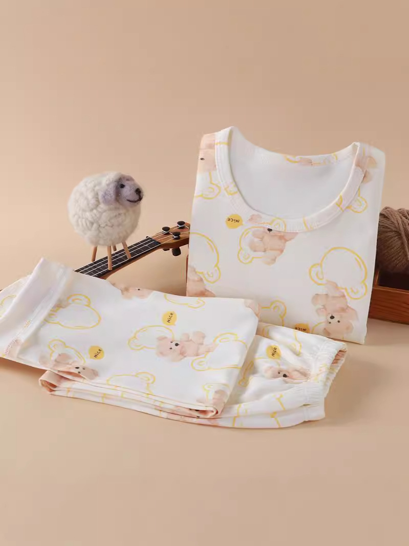 Nueva ropa infantil para el hogar sin huesos pijamas de manga larga primavera y otoño ropa de aire acondicionado de niñas algodón hombre
