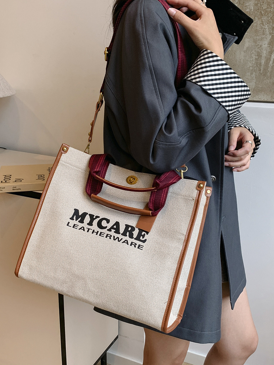 Bolsa de mano de lona de gran capacidad para mujeres 2024 nueva moda impresa letras mochilas bolsa de viaje casual