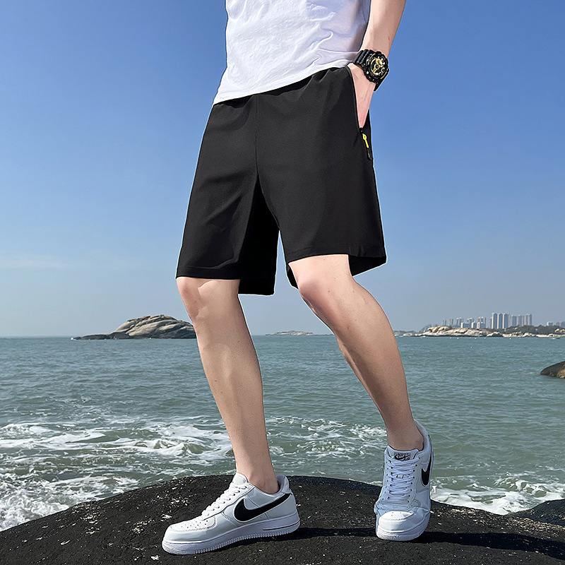 Pantalones deportivos casuales para hombres 2024 verano coreano cómodo hombre algodón recto suelto cinco pantalones cortos fabricantes lotes