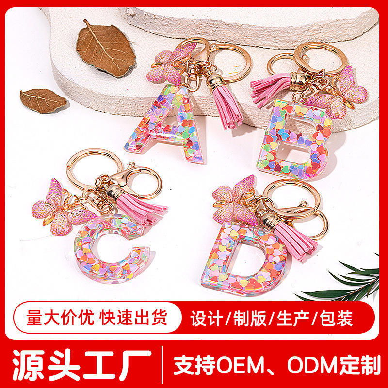 Cross-Border A-Z Resin English Alphabet Keychain with Sequins, Pink Butterfly Tassel Pendant, Backpack Decoration, Women's Gift