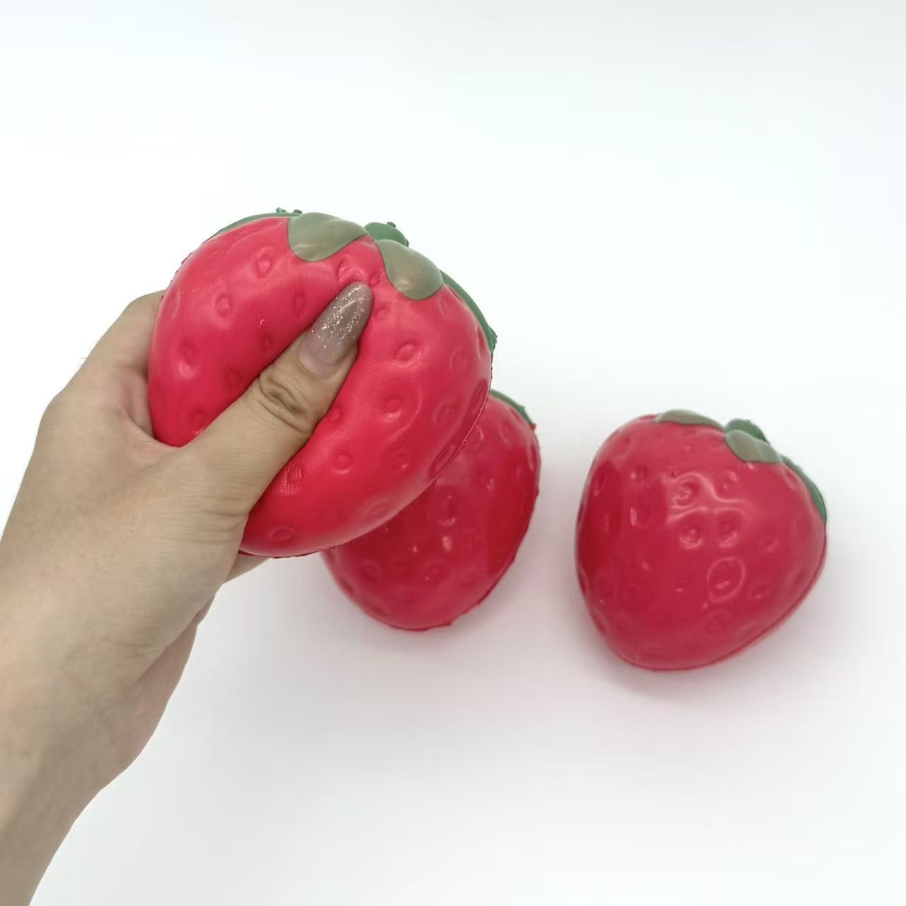 Comercio exterior transfronterizo explosión simulación de frutas fresa pellizco juguetes de descompresión rebote lento descompresión fresa de ventilación