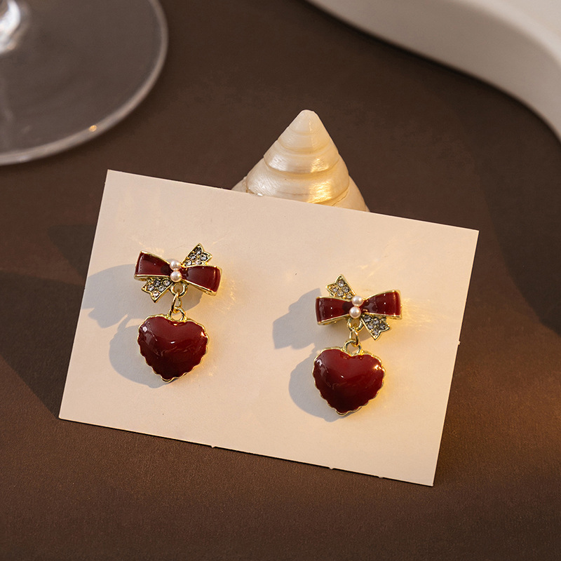 Retro burgundy demi-season earrings from pearl with bow