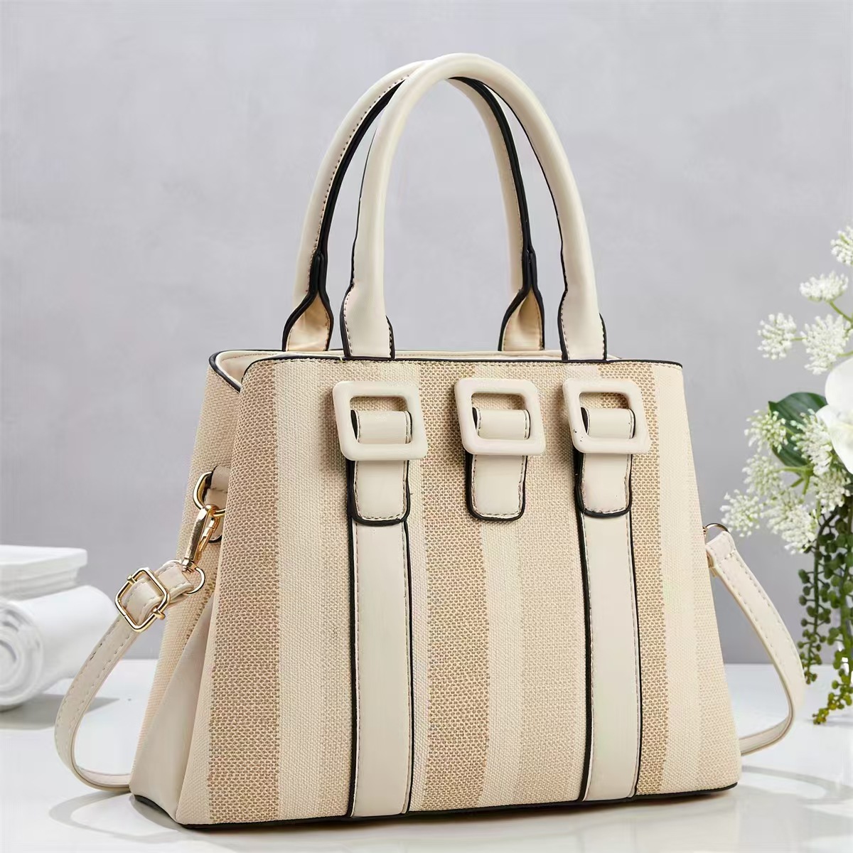 Bolsa de mano casuales a rayas simples temperamento de moda bolsas de hombro de viaje diario versátil mochila bolsas transfronterizas