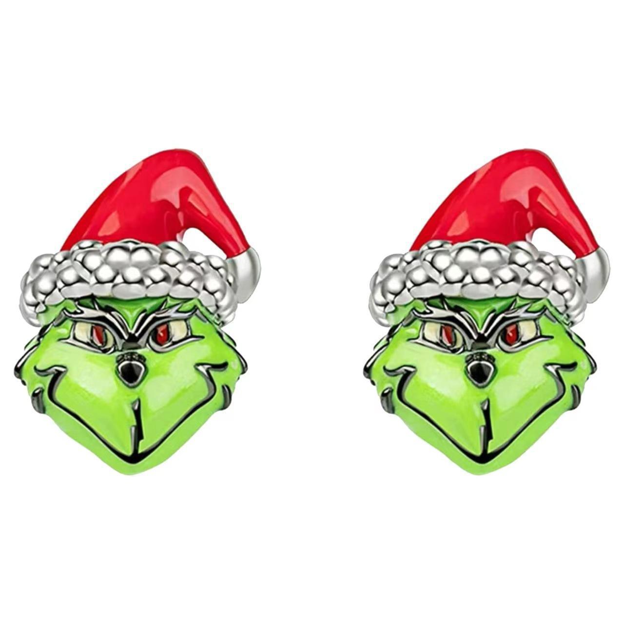 Moda europea y americana transfronteriza Navidad Grinch verde piel monstruo pendientes personalizados creativos en forma de mano joyería de estilo de fiesta