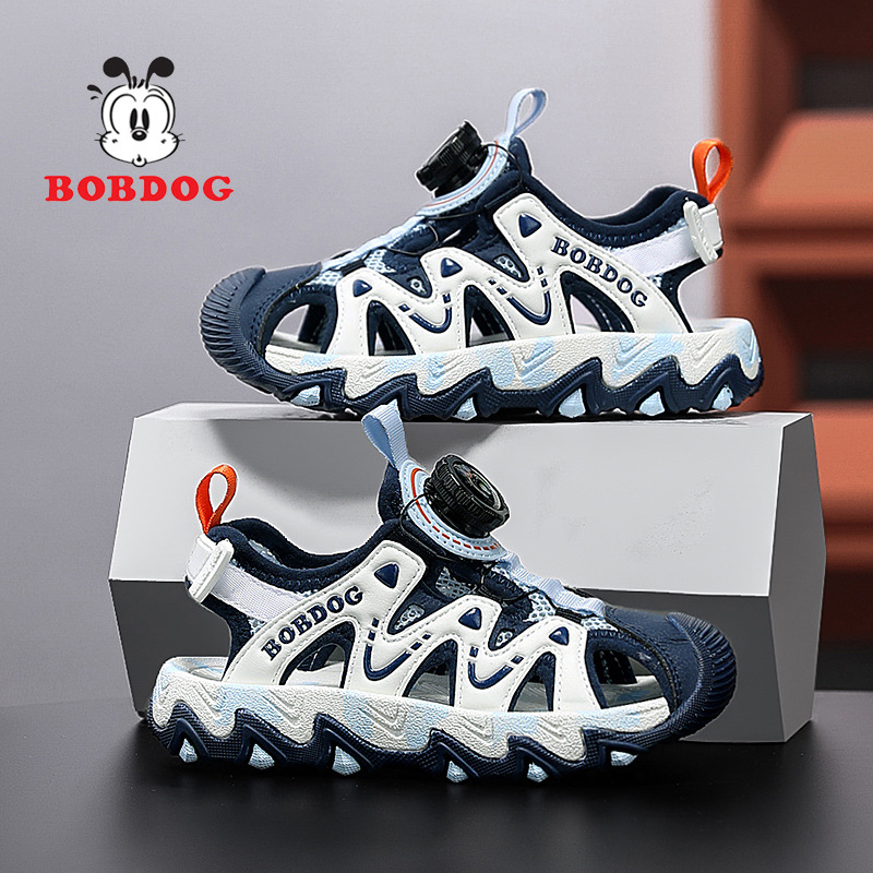 Sandalias Babudou para niño verano nuevo estilo antideslizante botón de suela suave sandalias Baotou zapatos de playa princesa para niñas grandes y medianas