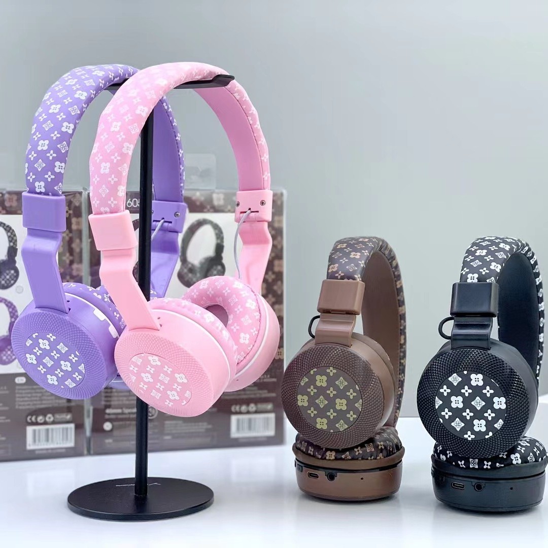 Nuevos auriculares con impresión AKZ-605 transfronterizos, Bluetooth inalámbrico, batería de larga duración, auriculares al por mayor de alta calidad