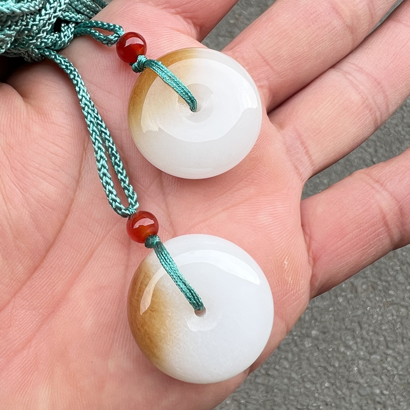 Wholesale gold silk jade crafts with sugar color safety buckle Xinjiang Hotan jade mutton fat white jade with lanyard jade pendant
