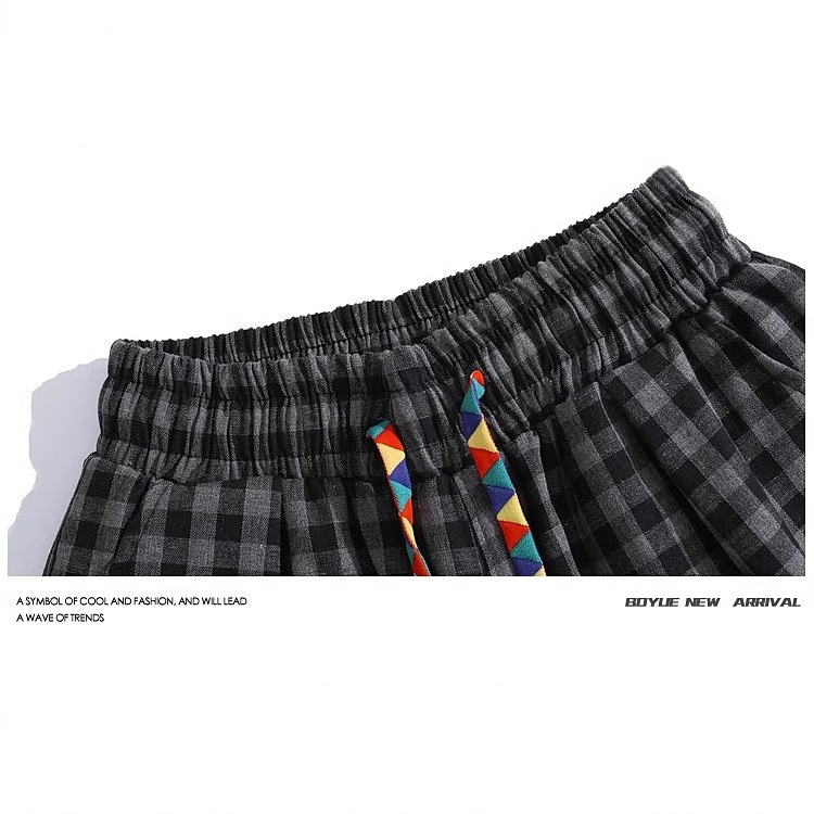 Retro pantalones cortos a cuadros negros y blancos para hombres y mujeres verano 2025 delgados de tirada deportivos casuales cinco pantalones delgados de piernas anchas