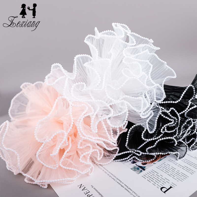 Hilo de onda bilateral plisado hilo de onda perla simple estilo Chanel ramo forro de flores papel de embalaje de flores de malla