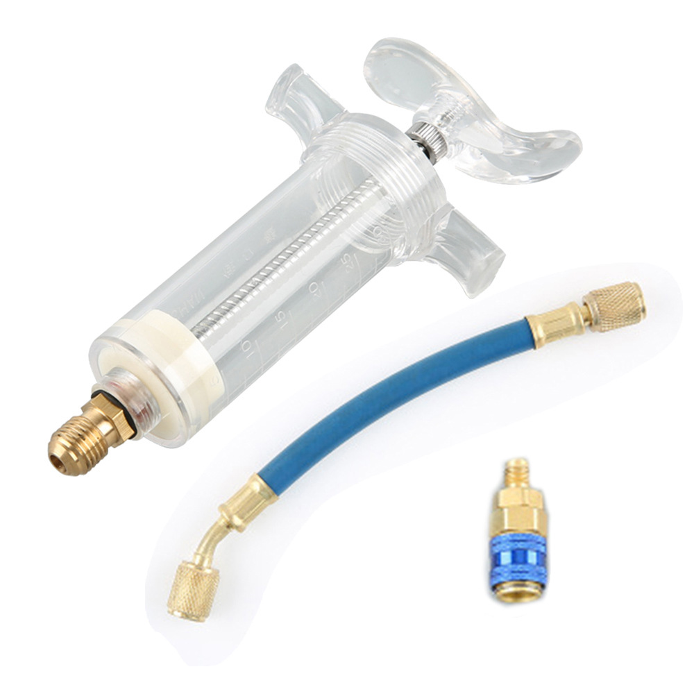 thumbnail image 1 of Herramienta de inyección de tinte para chorro de aceite de coche con aire acondicionado, 1 oz, 1/4 ", tubo de llenado de refrigerante de aceite líquido puro, caja azul, paquete uno, 1 of 2