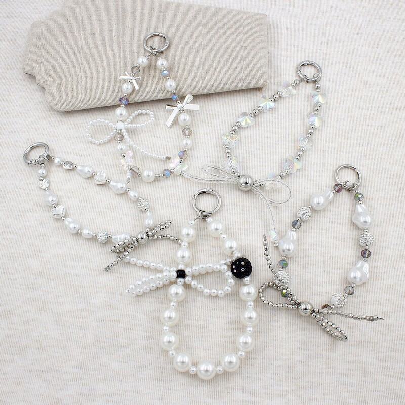 Chic style irregular pearl bow phone chain, high-end personalized phone strap, bag chain, bag pendant, handbag chain Chic style irregular pearl bow phone chain, high-end personalized phone strap, bag chain, bag pendant, handbag chain