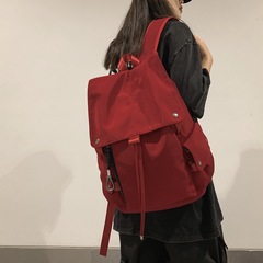 純色の中学高校の大学生のかばんの大容量の旅行のカップルのランドセルの街頭は学院の風のリュックサックの韓国に乗ります。