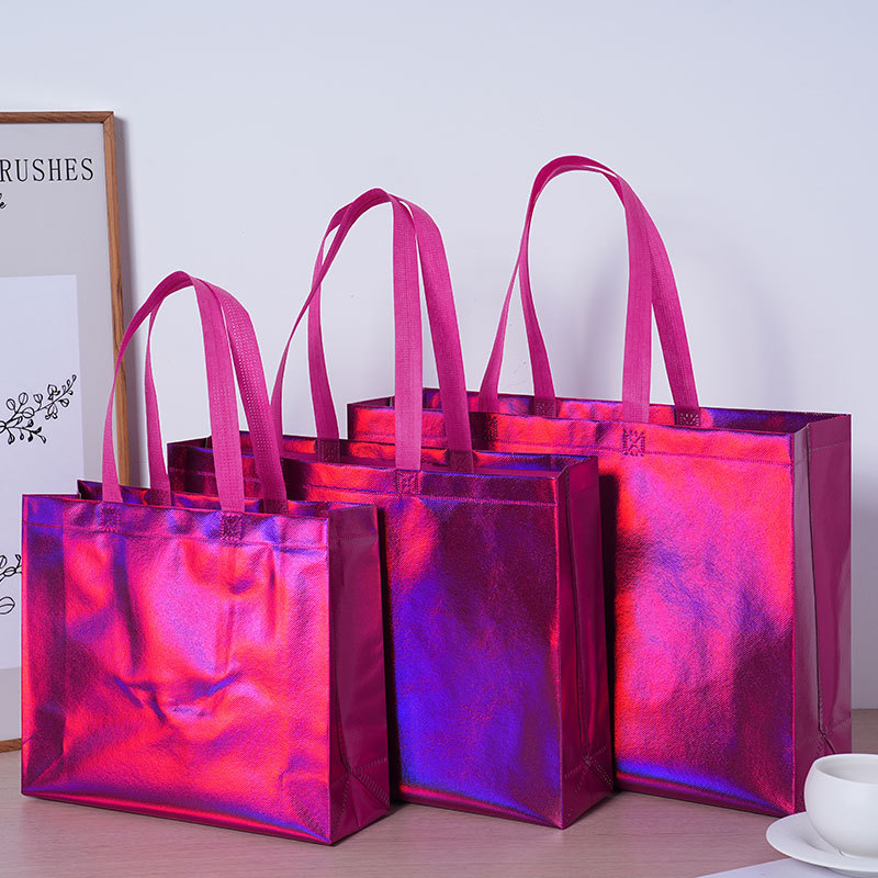 Bolsas de tela no tejida personalizadas fabricantes de alta calidad bolsas de mano no tejidas personalizadas bolsa de compras de ropa de mujer