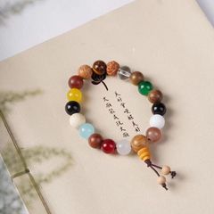 新商品の十八種の数珠盤は七色のブレスレットを遊んでいます。