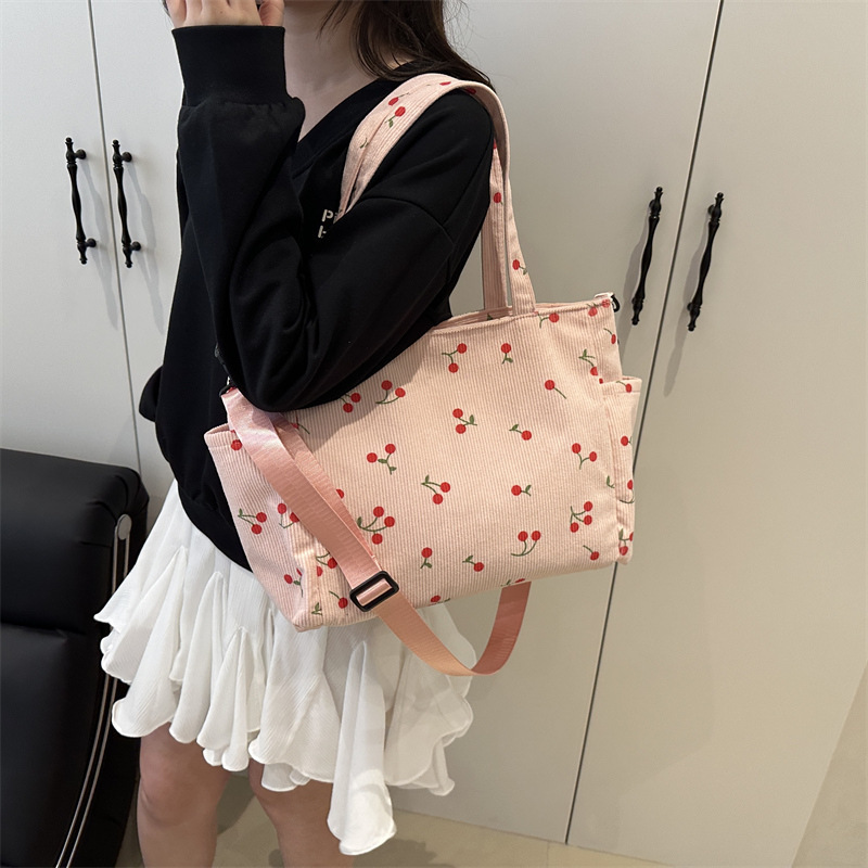 Este año, la popularidad de la bolsa de alto valor de la cara de 2025, primavera y verano, nueva moda, bolsa de hombro de gran capacidad, bolsa de ocio image 4
