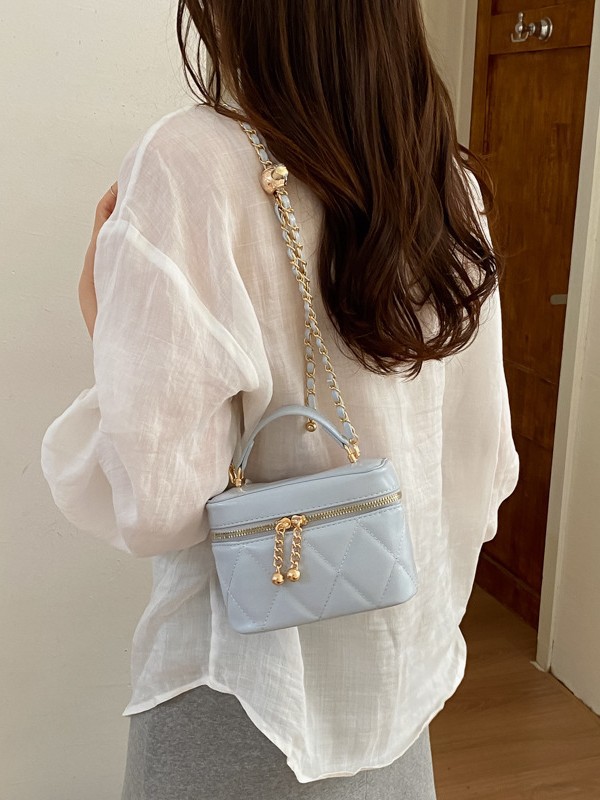 Caja de mano de nicho coreana, bolso pequeño cuadrado para mujeres 2026 nueva cadena de diamante moda versátil bolso de lujo ligero
