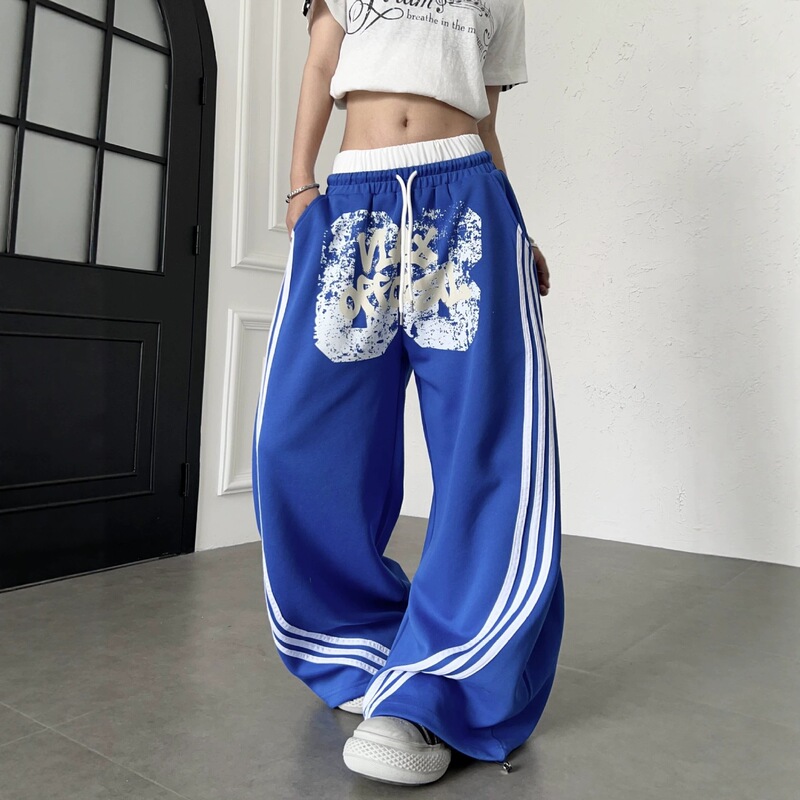 American retro graffiti lettering with three stripes on the side, distressed sweatpants for men and women, loose wide-leg casual long pants for spring and autumn American retro graffiti lettering with three stripes on the side, distressed sweatpants for men and women, loose wide-leg casual long pants for spring and autumn