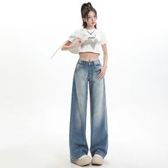 卸売り代はクラックを代行して青い腰の広い足のジーパンを洗います。