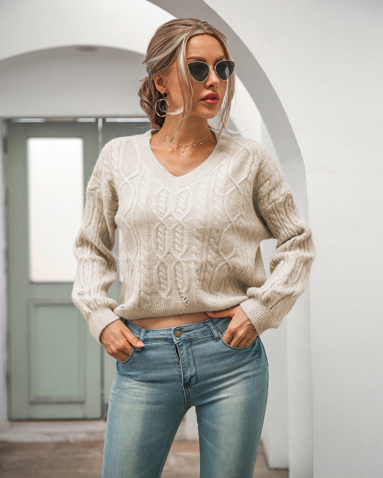 women s loose V-neck pullover long-sleeved twist sweater nihaostyles clothing wholesale NSBY76603