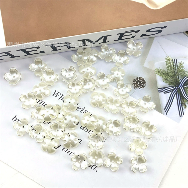 White three dimensional plastic hair accessory from pearl handmade, accessories