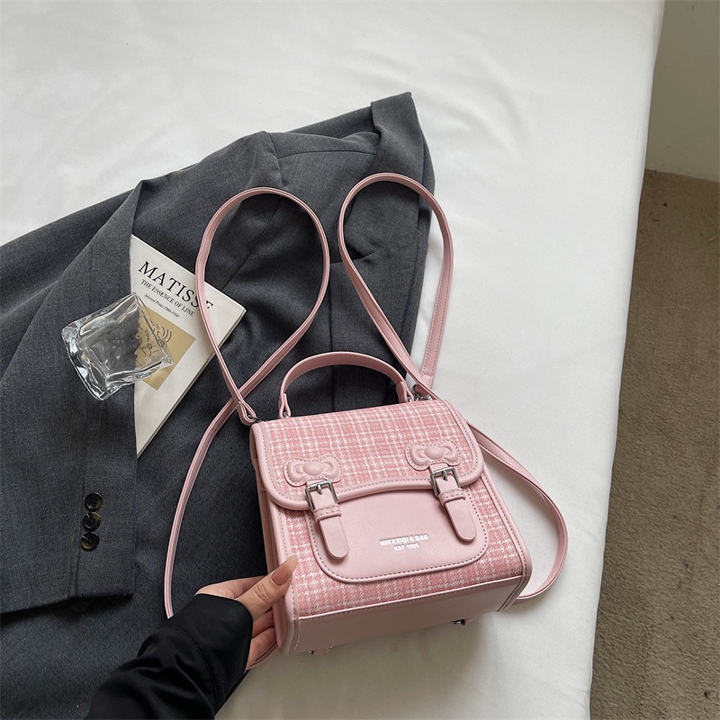 Mochila universitaria popular para estudiantes mochila casual de mujer estilo a cuadrícula nicho 2026 escuela de moda de verano nuevo estilo
