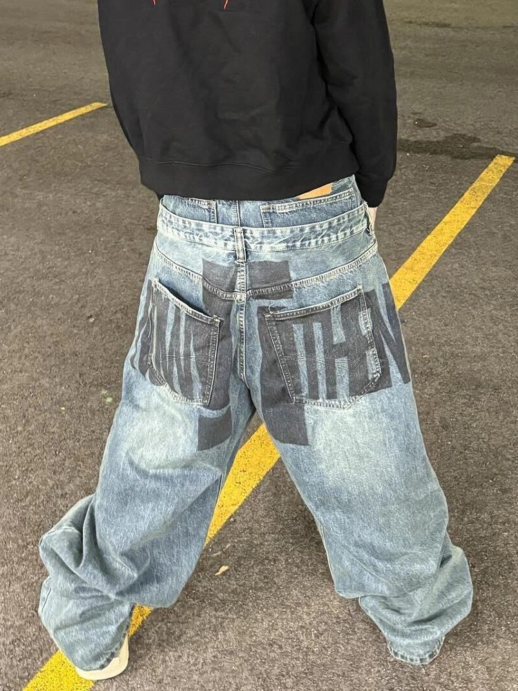 Gran tamaño de diseño americano deconstrucción de doble cintura cabeza jeans niños calientes retro suelta bf flojo viento slippers