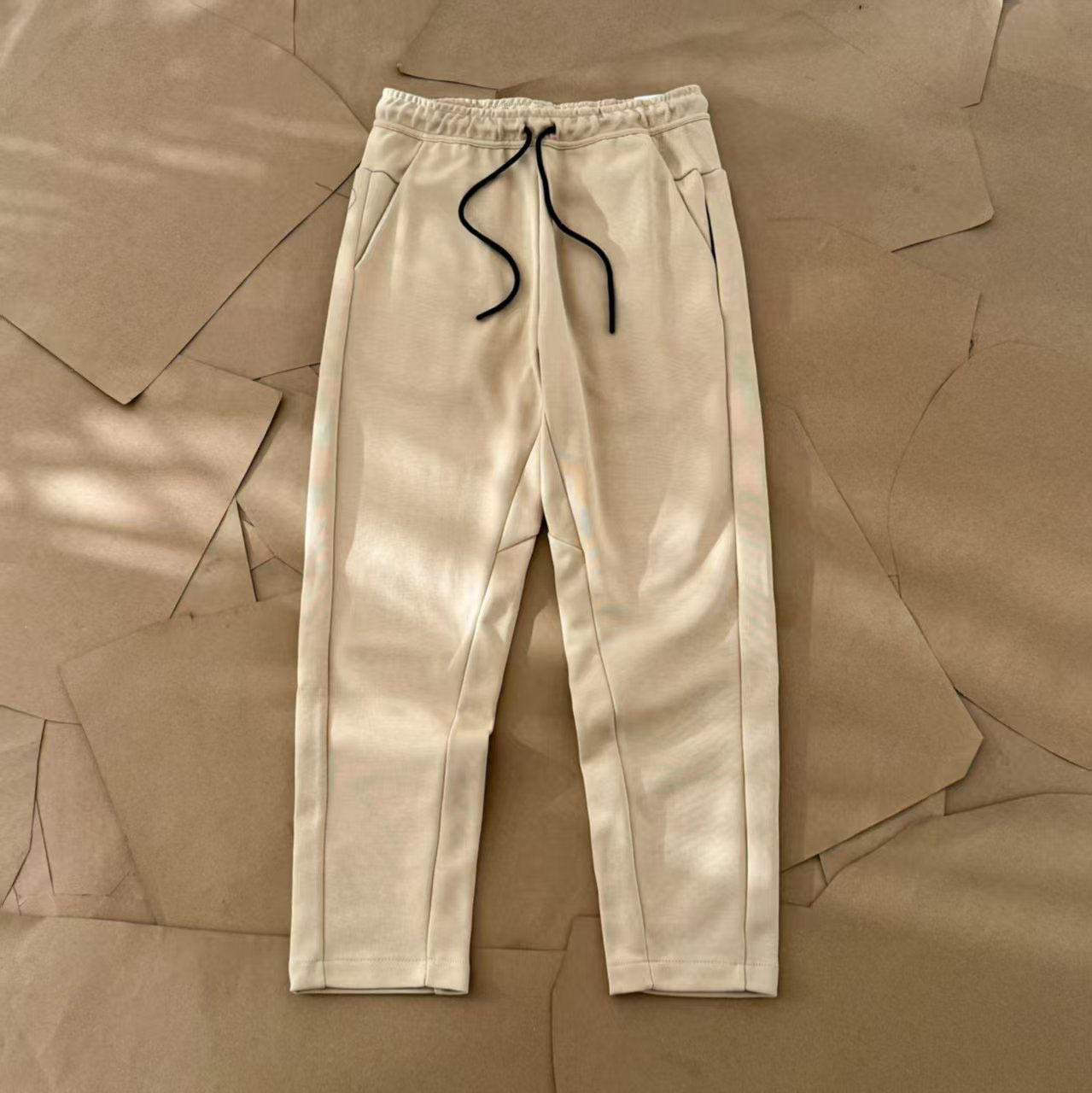 Nuevo hombre deportivo ocio al aire libre versátil punto suelto pantalones largos de piernas largas pantalones 211