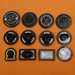High-end metal label patches for clothing decorations, accessories, shoes, hats, and luggage hardware components.