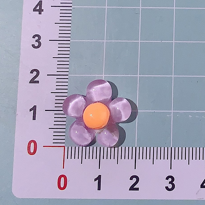 Nuevos accesorios de resina de cinco pétalos de hielo DIY crema pegamento para el cabello con cáscara de teléfono móvil agujero agujero de botón de zapato taza de agua pegatinas hechas a mano