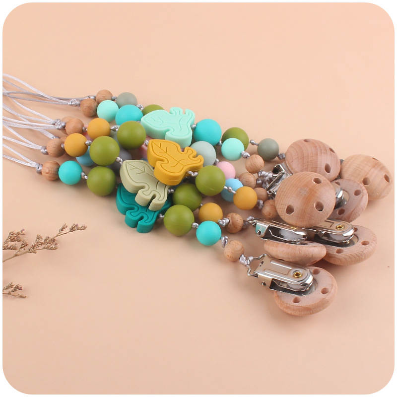 Bebé suministros de dibujos animados hojas de silicona mordedor creativo bebé DIY silicona mordedura molar Cadena de pezón Nuevo
