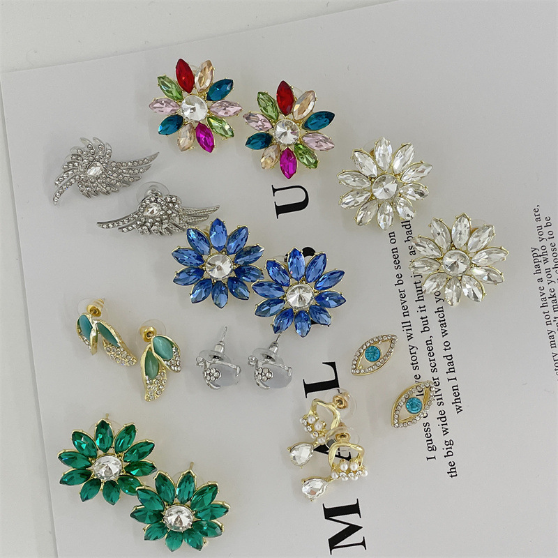 Fashion Eye Flower Alloy Inlay Rhinestones Womenu0027S Earrings 1 Pair