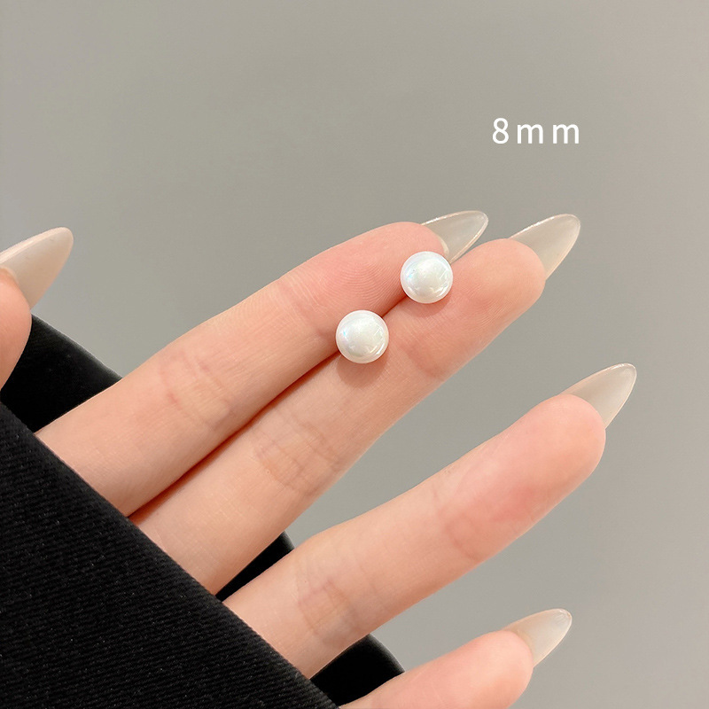 Pendientes de aro lisos para mujer, lujo ligero, pendientes de alta gama, pendientes populares, aretes de diseño exclusivo, aretes de otoño e invierno al por mayor