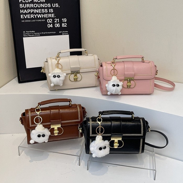 Bolsos de textura superior para mujeres 2025, nueva moda versátil bolso de mochila primavera y verano popular bolso de mano