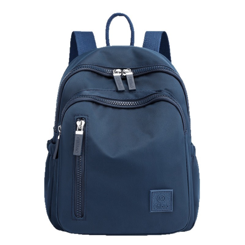 Mochila sencilla e informal para mujer, bolso portátil de gran capacidad para viajes y desplazamientos, mochila versátil de tela de nailon de gran capacidad para mujer