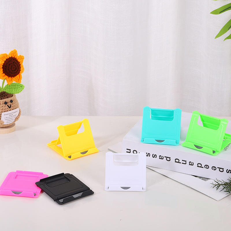 Creativo perezoso soporte de teléfono móvil de escritorio simple soporte de teléfono móvil de plástico plegable regalos al por mayor regalos se pueden imprimir LOGO