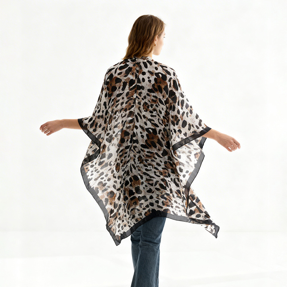 Impresión europea y americana de leopardo de moda de playa sexy diosa cardigan largo trajes de baño con camiseta de mujer sopa protector solar