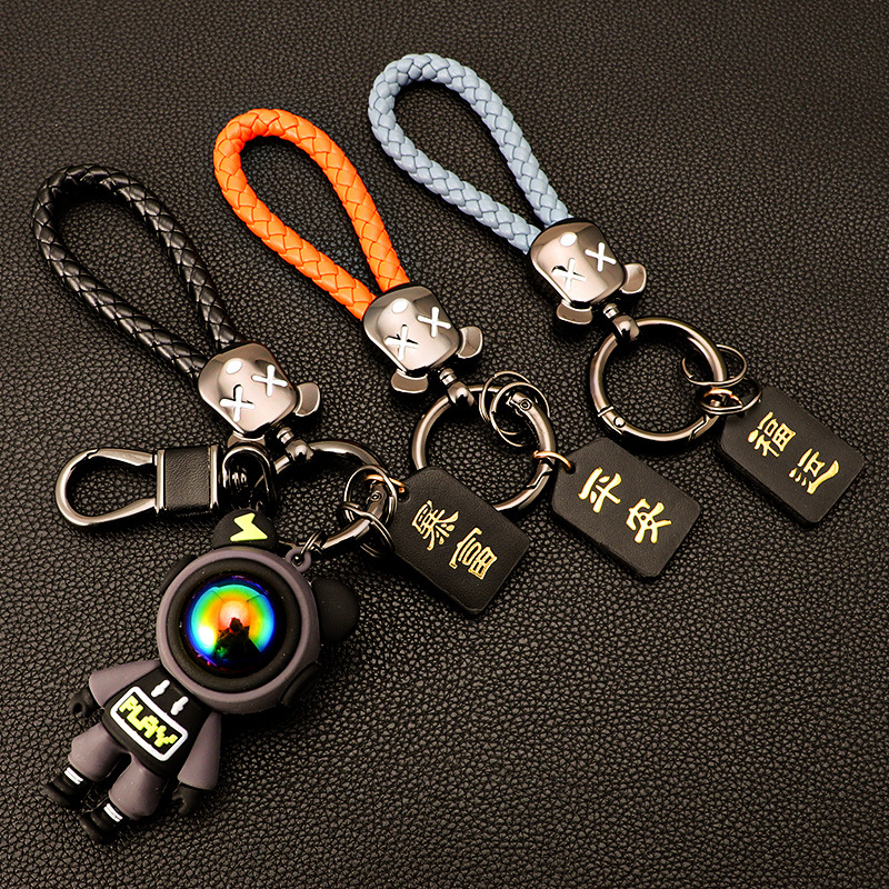 Cross-border Lightning Bear Car Llavero de silicona Colgante de oso violento Cuerda de mano Llavero de cuero de alta gama Fu
