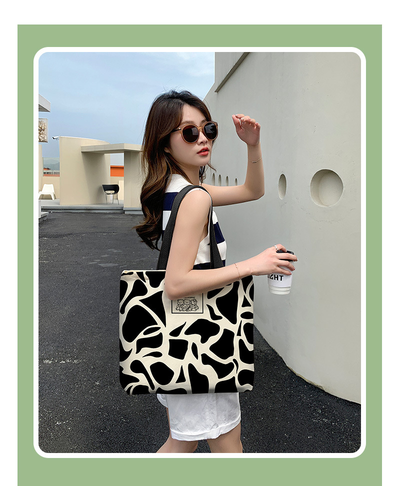 Women's Fashion Cow Pattern Canvas Shopping Bags display picture 9