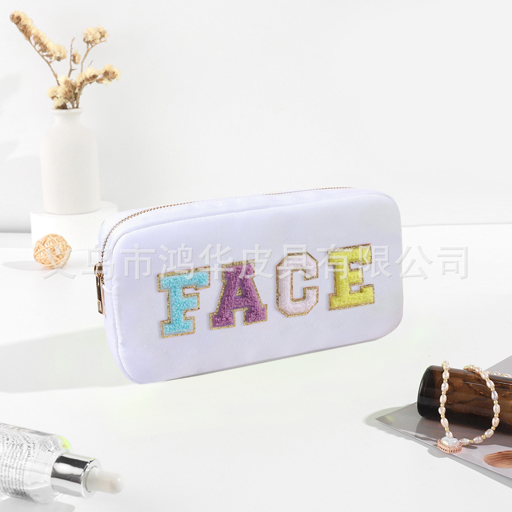 Transfronterizo amazon popular toalla bordada carta de nylon bolsa de cosméticos bolsa de almacenamiento de gran capacidad informal de las mujeres a prueba de agua