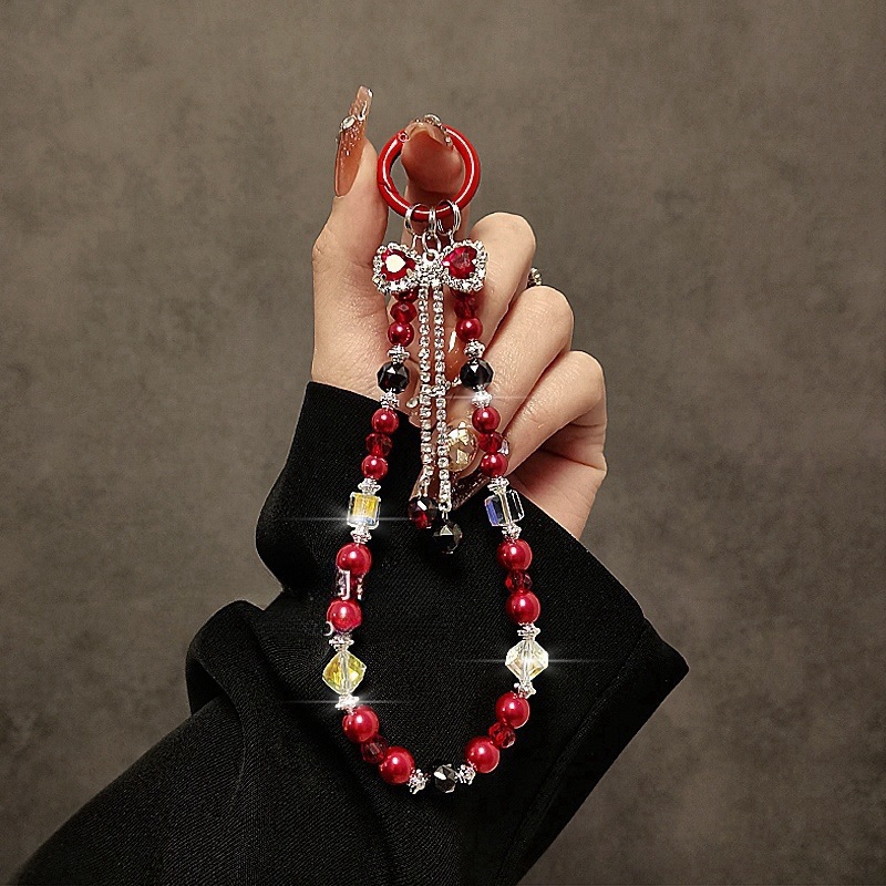 Fashionable and luxurious rhinestone bow tassel mobile phone chain, crystal bead mobile phone lanyard, short wrist handbag chain.