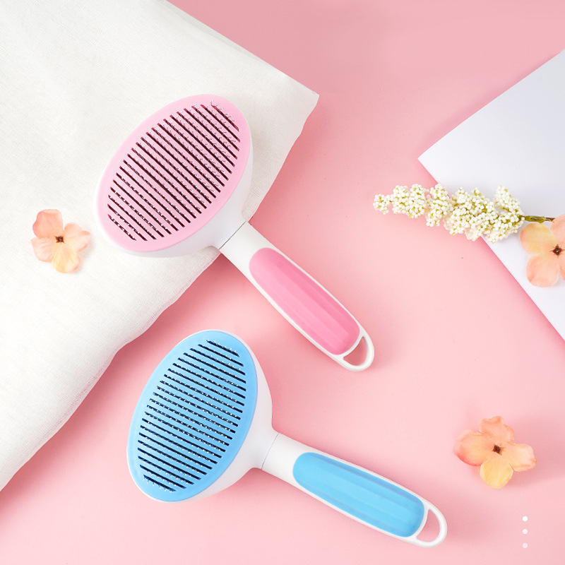 Nuevo peine transfronterizo para mascotas con un solo clic en la eliminación del vello aguja peine gato y perro peine de pelo de la pierna automática gato y perro peine de aguja de nudo automático