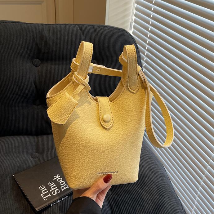 Bolso de canasta de verduras súper caliente transfronterizo femenino 2025 nuevo bolso de cubo de ocio simple moda bolso de hombro de todo fósforo