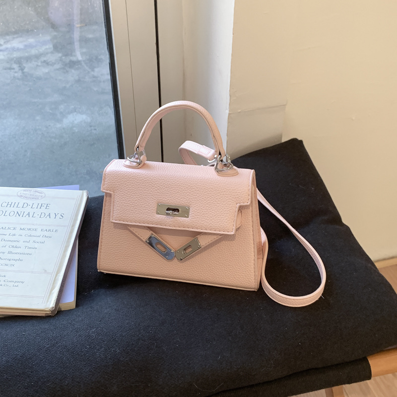 Bolso de mano de alta sensación para mujeres 2026 nuevo retro lichi Kelly bolso nicho lujoso mochila de hombro image 15