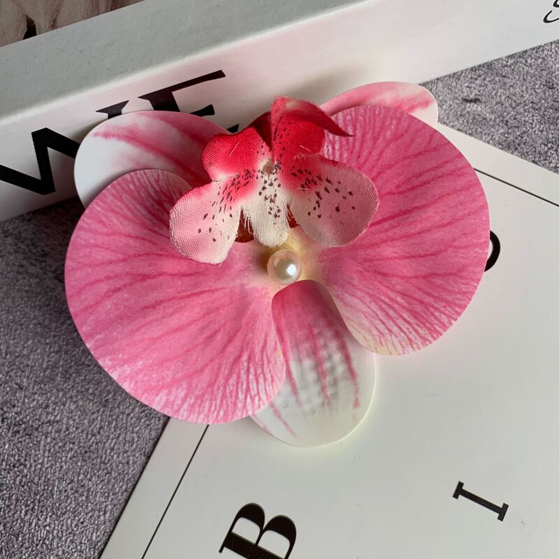 絹布の胡蝶蘭の花の頭は花の壁の部品の花の材料の頭をシミュレーションして髪を飾ってdiyの手作りの結婚祝いの贈り物を挟んで造花を飾ります。|undefined