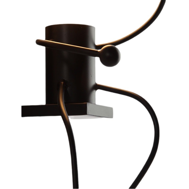 Transfronterizo retro creativo villano de dibujos animados lámpara de pared columpio pequeño hombre de hierro dormitorio arte decorativo lámpara de noche