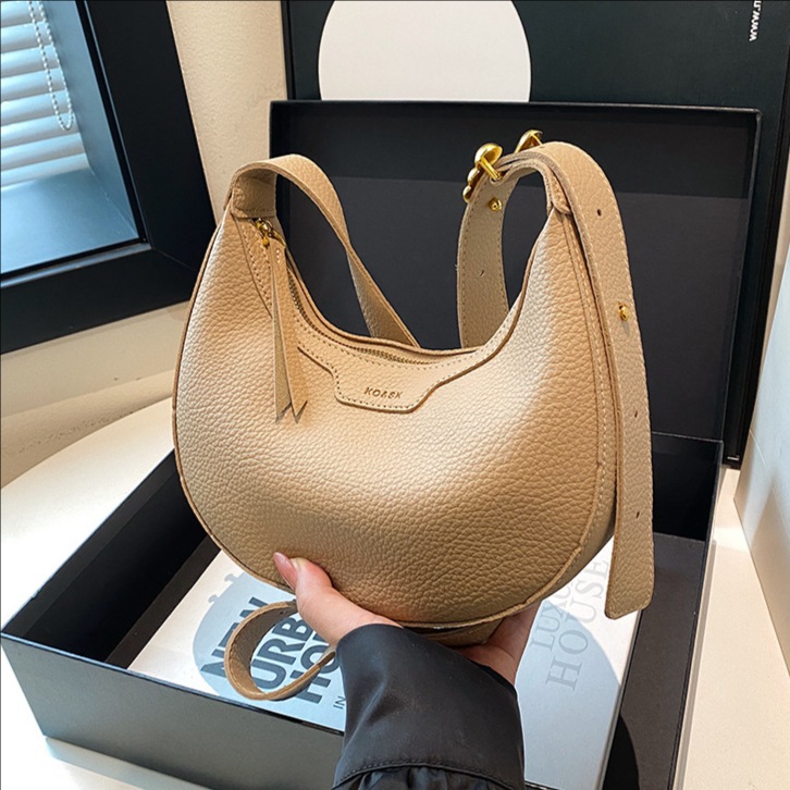 Bolso de bola de masa de nicho transfronterizo bolso de mujer 2025 nuevo bolso de hombro de viajero de moda retro bolso de mensajero de mujer