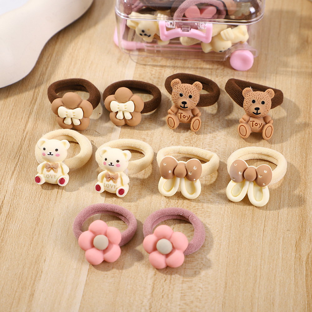 Una pequeña caja de tracción de café de leche para niños cuerdas de cabello correa no daña el cabello de las niñas lindas toallas anillo de venta transfronteriza caliente