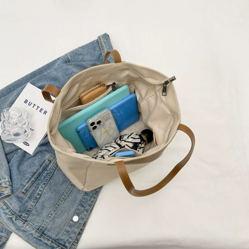 Demi-season universal capacious shoulder bag