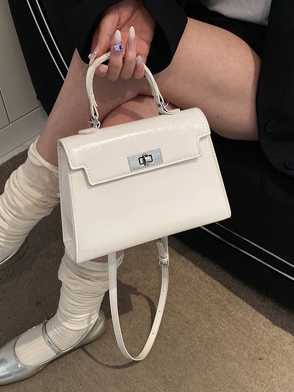 Transfronterizos coreanos de viaje simple de moda moda bolsas de mano Kelly de moda casuales de color sólido de alto valor de cara bolsas mochilas para mujeres