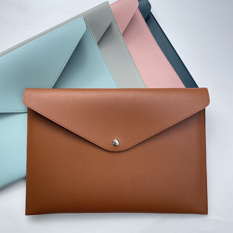 Factory hot selling laptop 13-inch computer bag hand holding MacBook liner bag waterproof leather cover A4 file bag